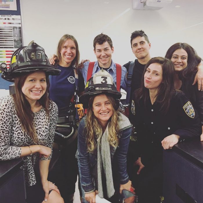 Christina Kallas with FDNY women firefighters and The Rainbow Experiment cast members Nina Mehta, Booker Garrett and Margaret Champagne.